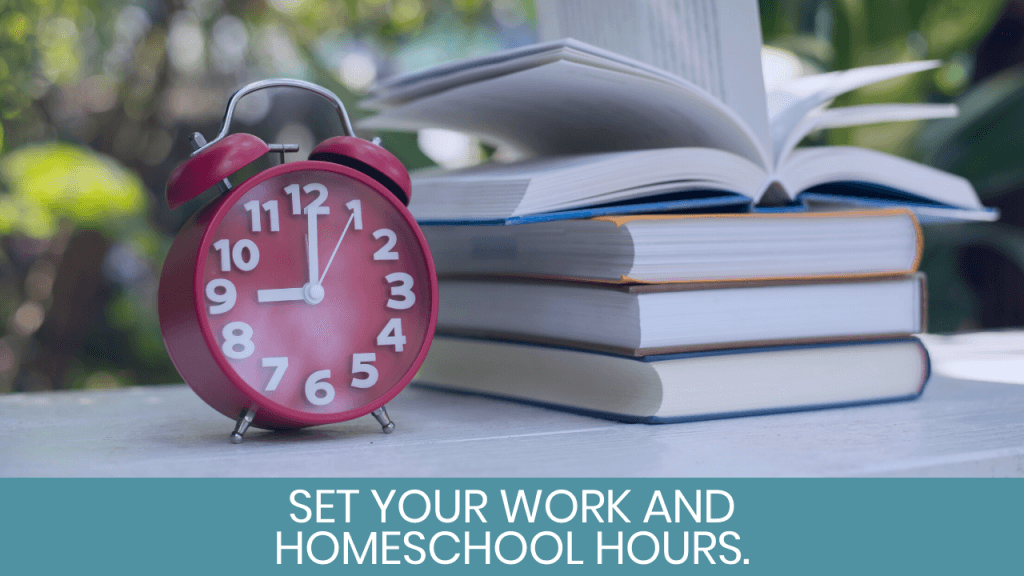 Red clock and books on a table