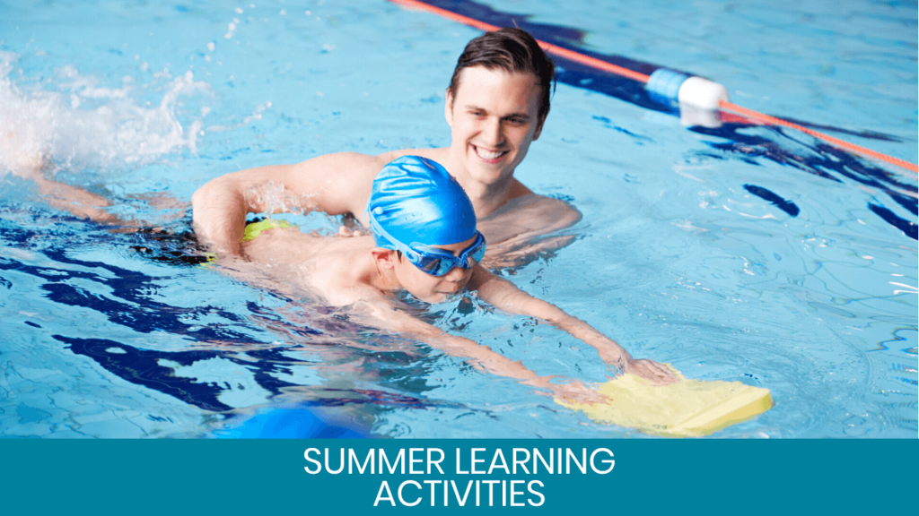 Man helping boy on swimming lesson