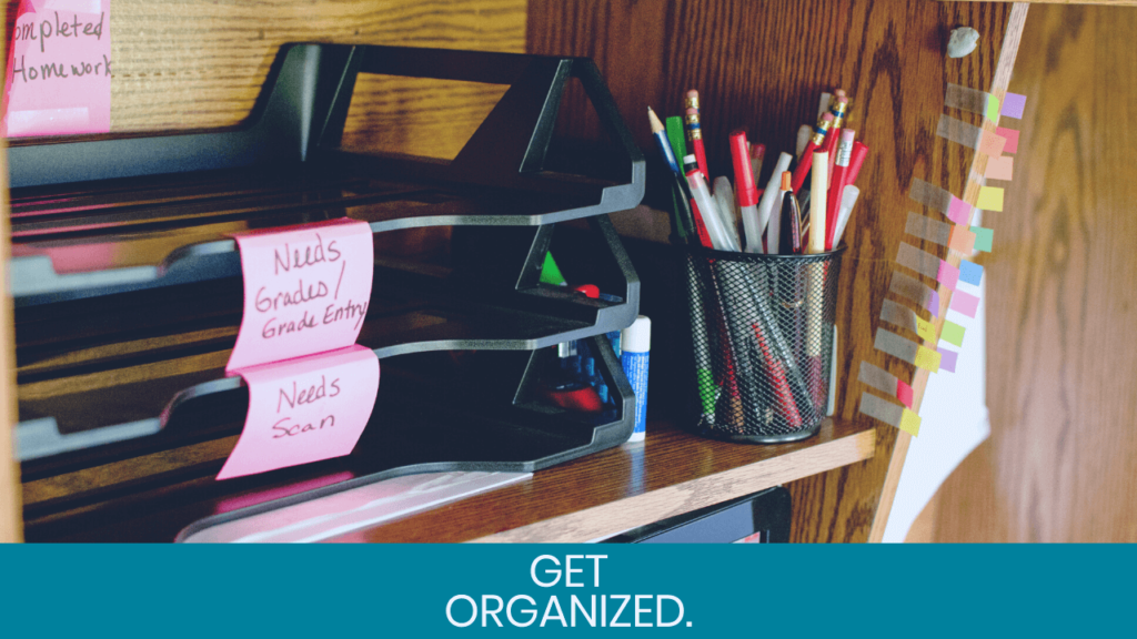 Organized shelf with pens and notes
