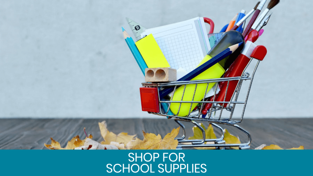 School supplies in miniature shopping cart