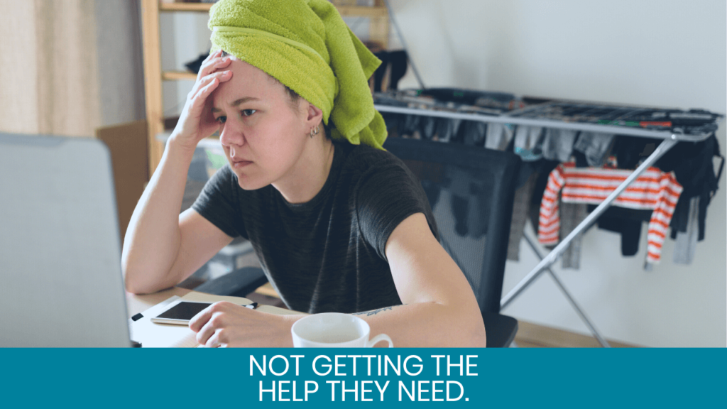 Woman looking worried looking at computer