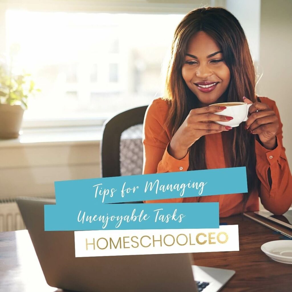 Woman smiling at computer with a coffee mug on her hands